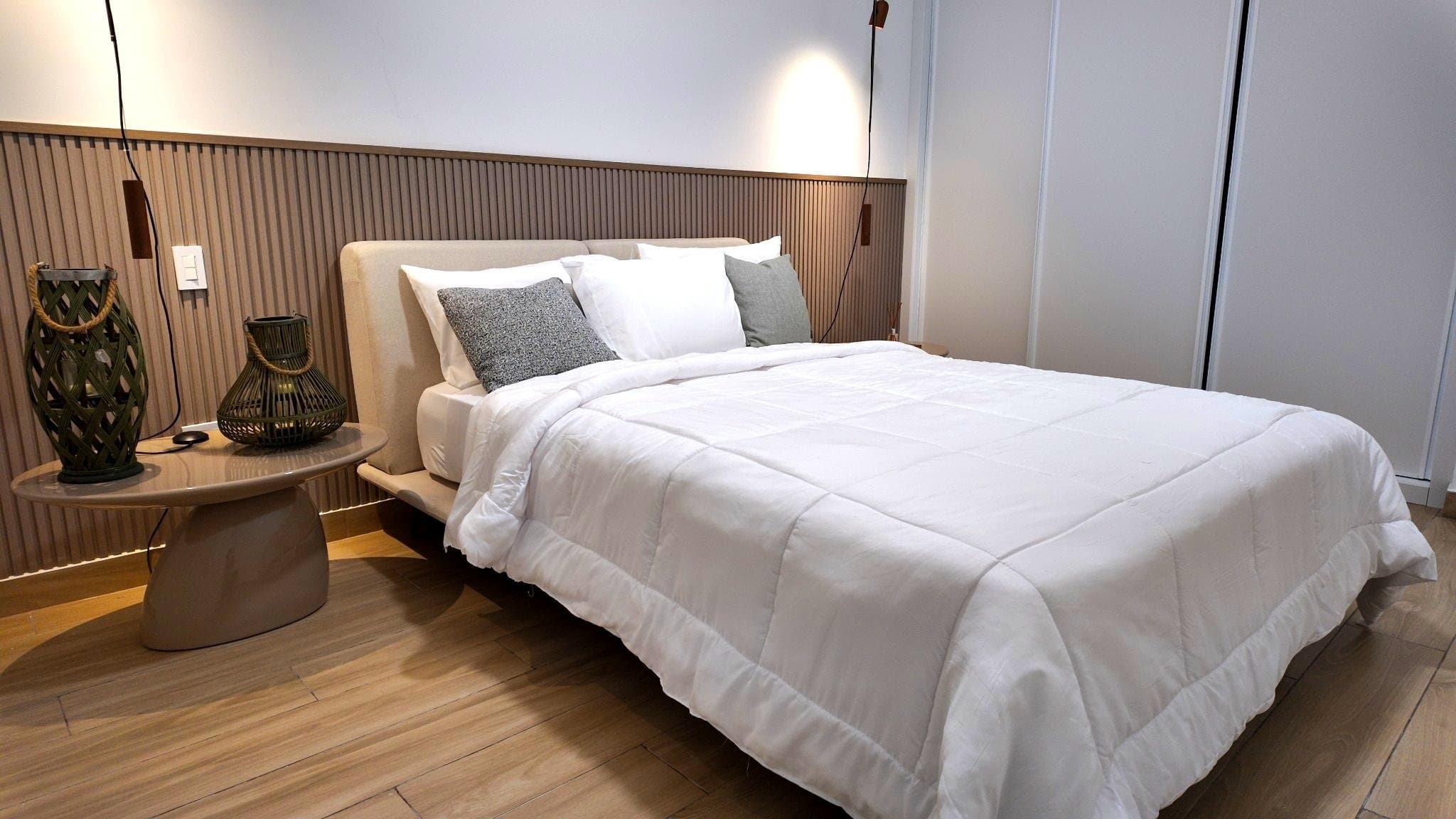Bedroom with warm timber feature wall